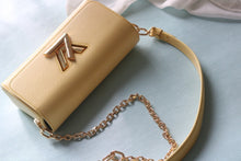 Load image into Gallery viewer, LB1162 Twist West Pochette / 7.5 x 4.1 x 2.6 inches