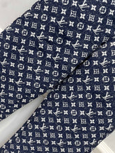 Load image into Gallery viewer, CLTH386 LB Monogram Denim Bootcut Jeans