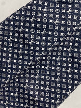 Load image into Gallery viewer, CLTH387 LB Monogram Denim Midi Skirt
