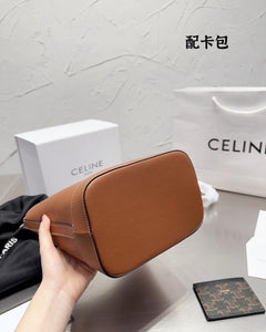 CL095 SMALL BUCKET CUIR TRIOMPHE (Gift with Card Holder)