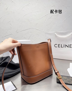 CL095 SMALL BUCKET CUIR TRIOMPHE (Gift with Card Holder)