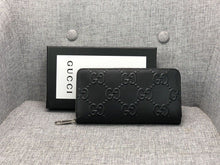 Load image into Gallery viewer, GC461 GG Embossed Zip Qround Wallet / 7.5&quot;W x 4.1&quot;H x 1&quot;D
